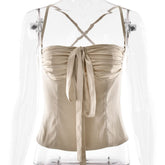 Ruched cross back zip-up bowknot top