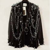 Long sleeve PU leather metal chain skull applique top