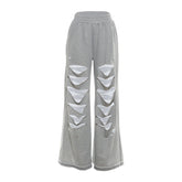 Ripped medium rise solid wide leg pant