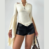 Long flared sleeve v neck ruched solid top