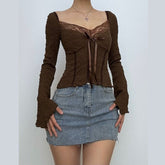 Long sleeve textured bowknot lace hem top