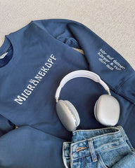 "Migränekopf" Rundhals-Sweatshirt â€?Hör auf deinen Körper & ruh dich aus.
