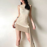 Crewneck irregular hollow out sleeveless solid cut out top