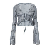 Long flared sleeve v neck self tie ruffle flower print top