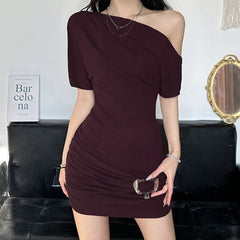 One shoulder ruched short sleeve metal applique mini dress