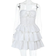 Smocked ruffle self tie mini dress