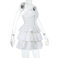 Smocked ruffle self tie mini dress