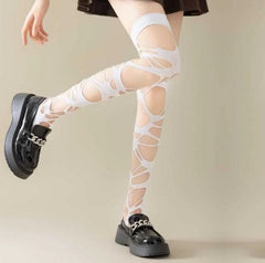 Hollow out irregular thigh high socks