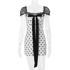 Polka dot bowknot zip-up puff sleeve top