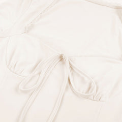 Long sleeve self tie solid top