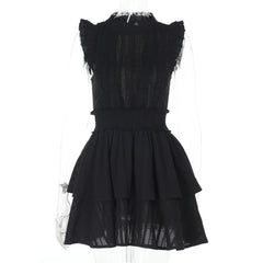 Cap sleeve ruffle smocked mini dress
