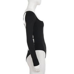 Long sleeve cross back solid bodysuit