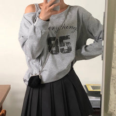 Irregular long sleeve letter pattern self tie top