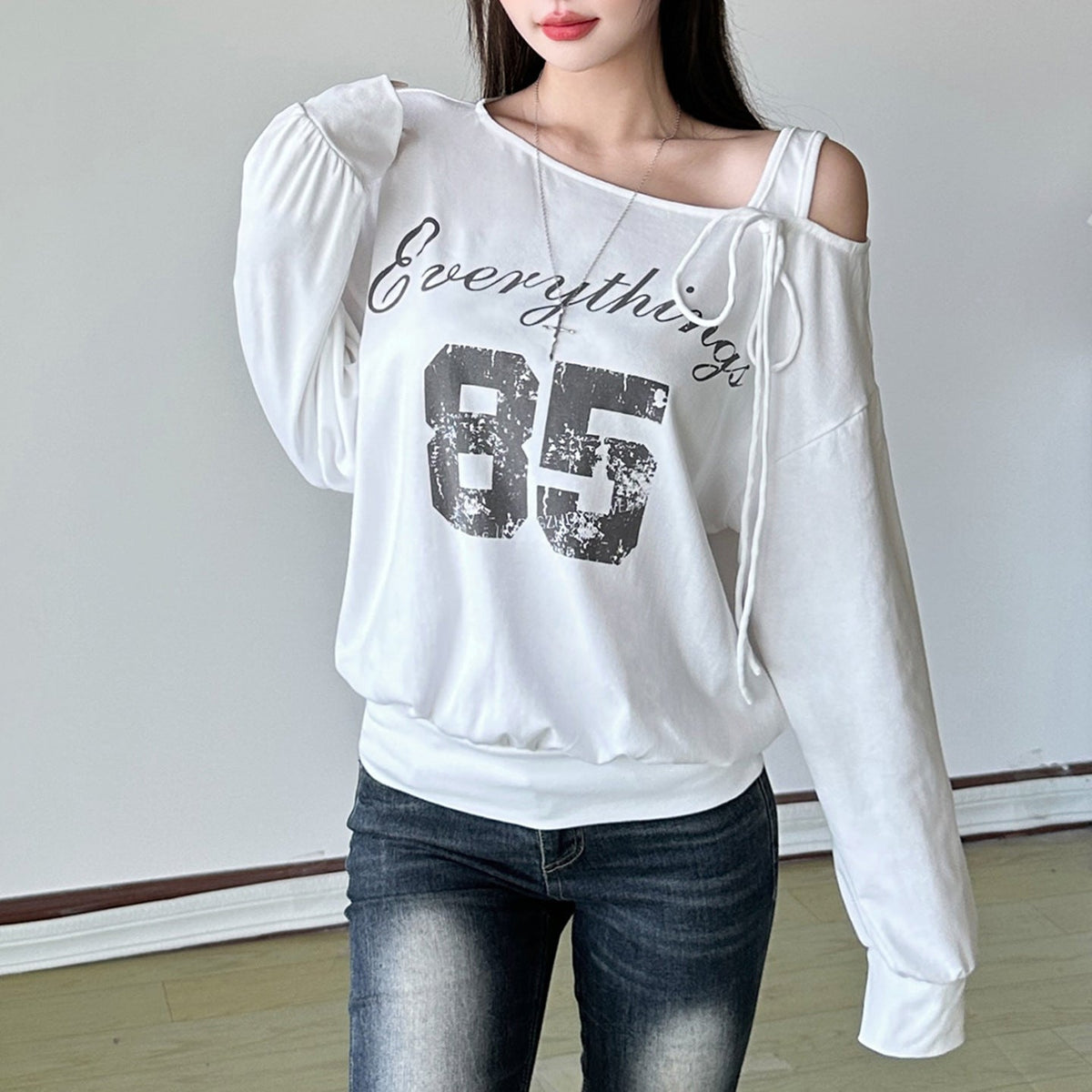 Irregular long sleeve letter pattern self tie top