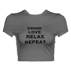 Short sleeve crewneck ruched letter print crop top