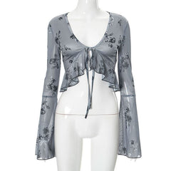 Long flared sleeve v neck self tie ruffle flower print top