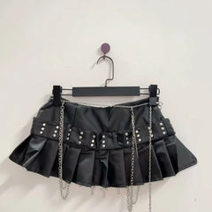Cross applique pleated zip-up o ring mini skirt