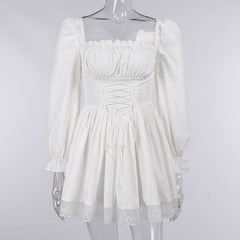 Long sleeve smocked lace up lace hem mini dress