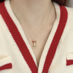 Bowknot faux pearl bell decor necklace
