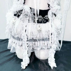 Lace hem self tie bowknot skull applique top